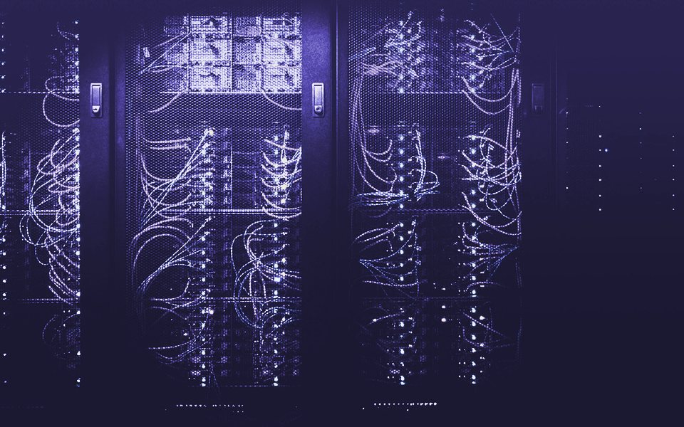 Server racks with network cabling in a data center